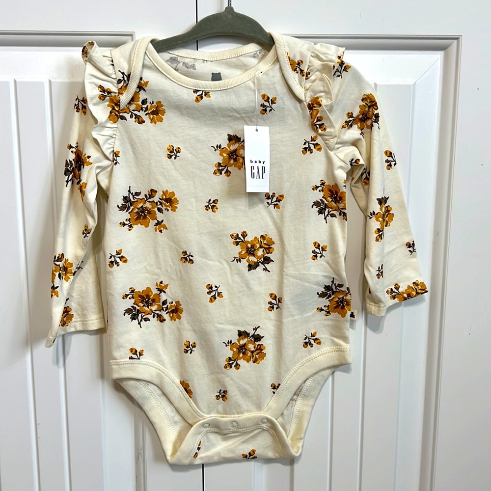 Floral onesie with ruffle detail NWT
